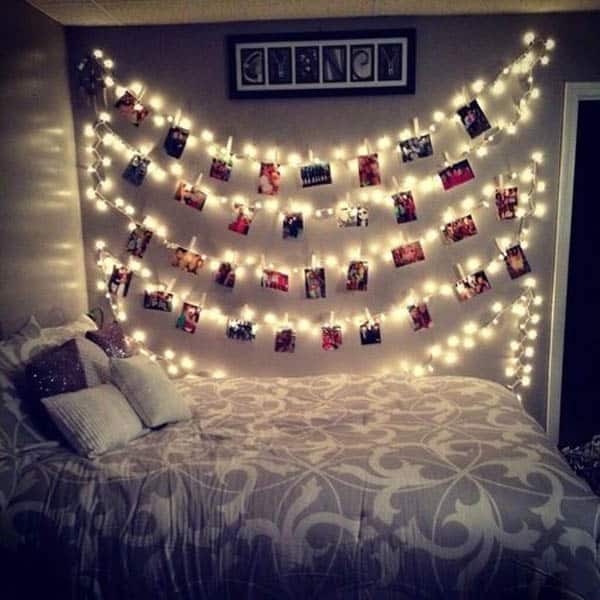 ... pictures with clothes pins on your twinkle lights to illuminate them